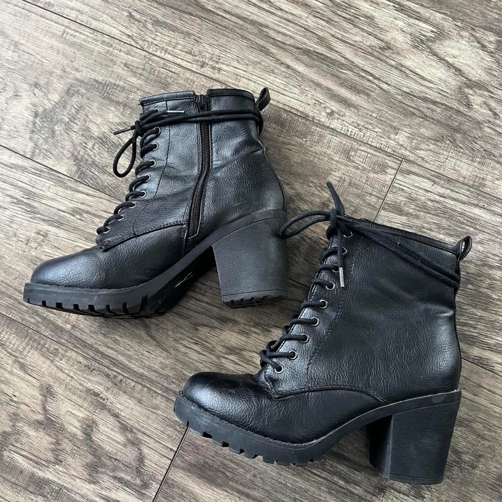 Black heeled combat boots